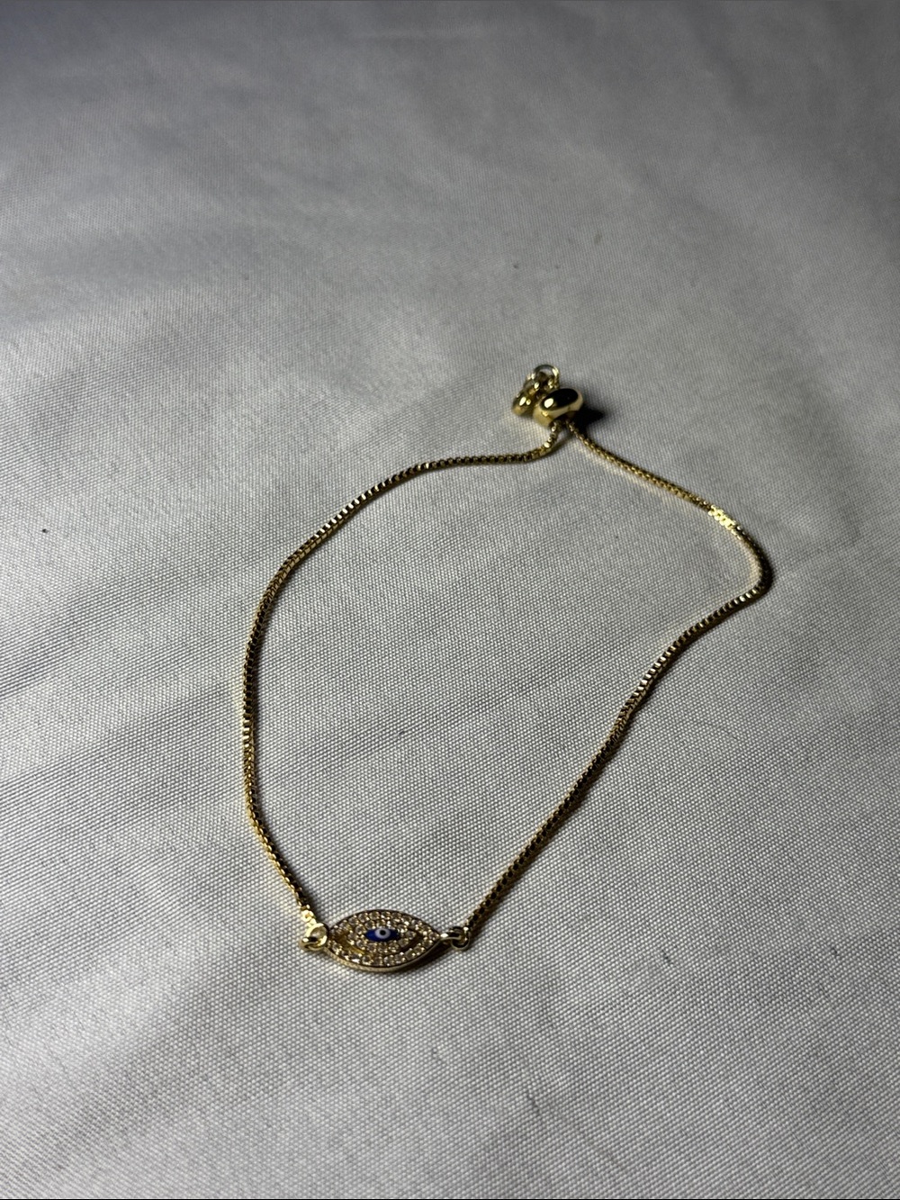 Gold Evil Eye Bracelet with Blue Accent